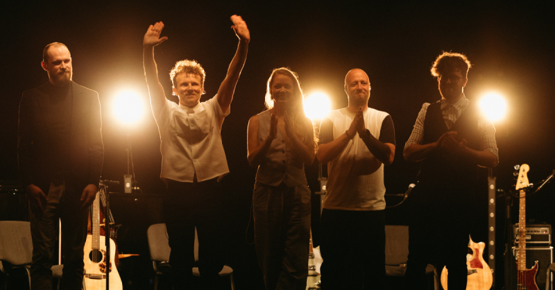 Latvian Band "The Sound Poets" are standing on the stage after their performance